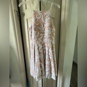 Stunning blush with white sequined floral pattern tulle overlay dress.